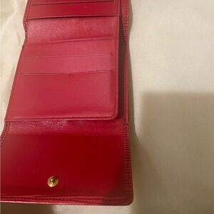 Lv Red and brown wallets @ $150 each